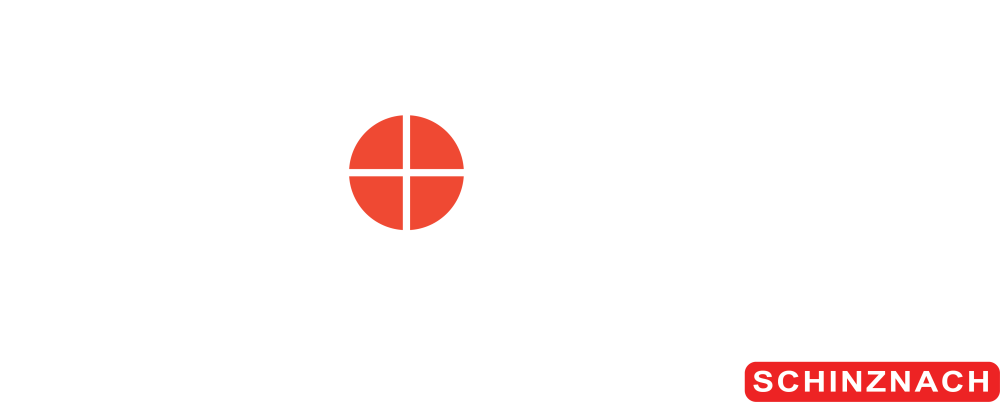 a white and orange circle with a black background